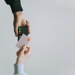 Modern contactless payment using a card and terminal, highlighting the ease of digital transactions.